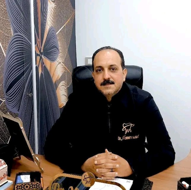 د/ مؤمن سعيد طب و جراحة الفم والأسنان في الإسكندرية 7 د. مؤمن سعيد — طب وجراحة الفم والأسنان
