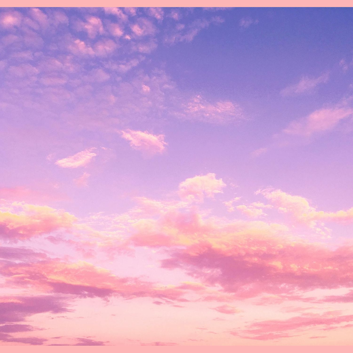Pink and purple clouds in evening sky