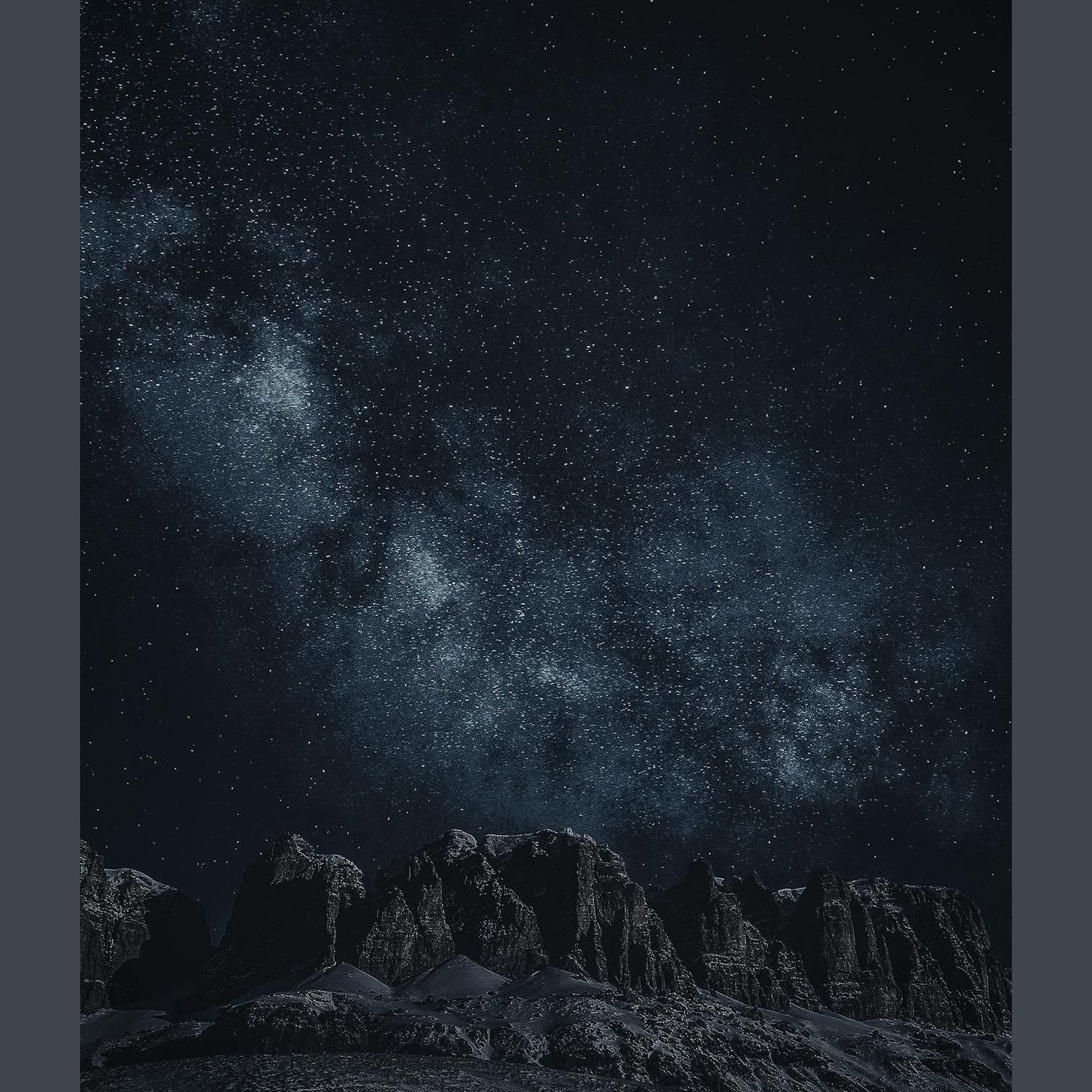 Starry sky with Milky Way over mountains